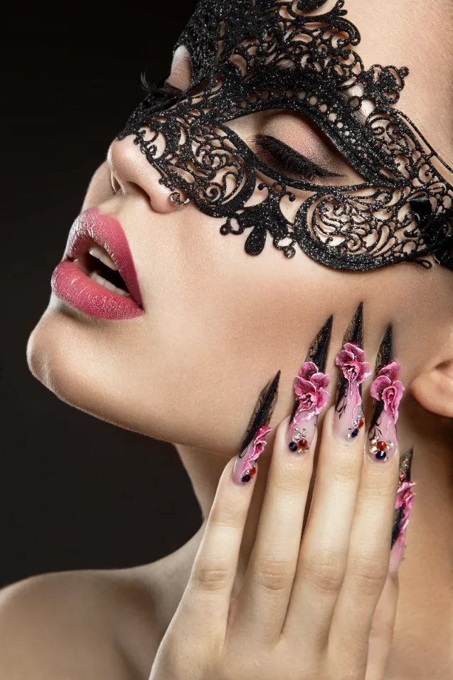 A beautiful girl with mask and highlighting her amazing nail art.